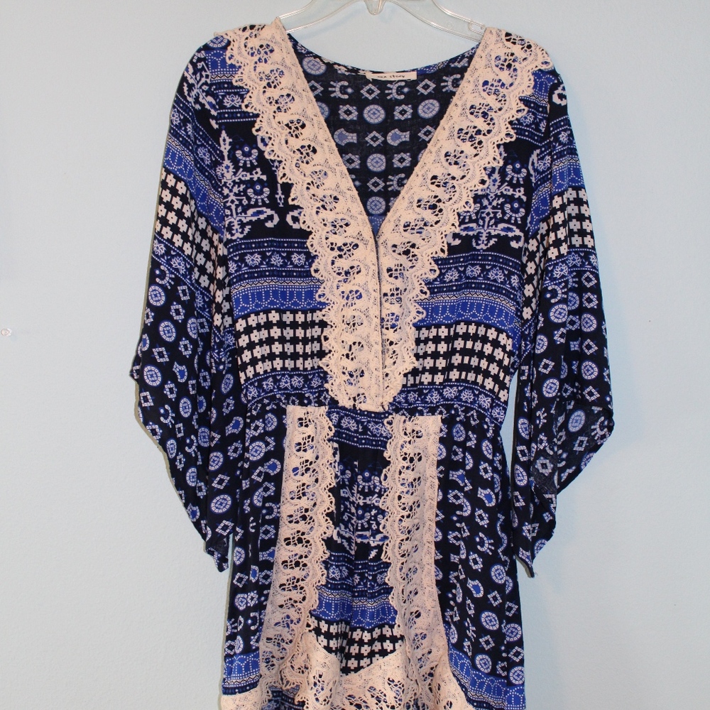 Blue Romper with Lace - One Story